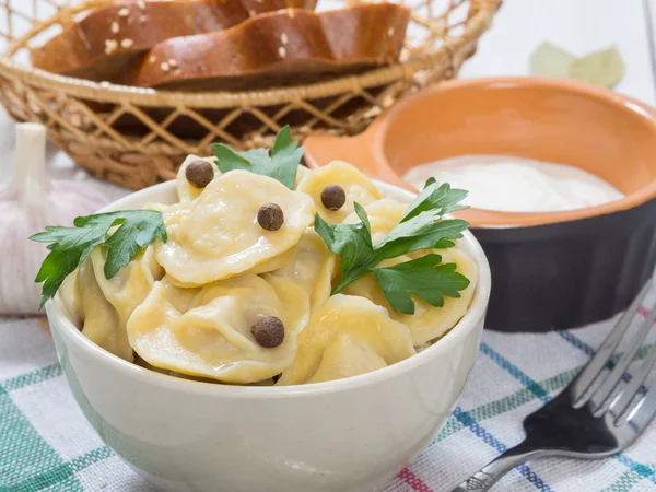 Russian dumplings with greens. Russian traditional dish