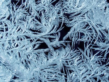 Kış arkaplanı, penceredeki don. Buzlu cam.