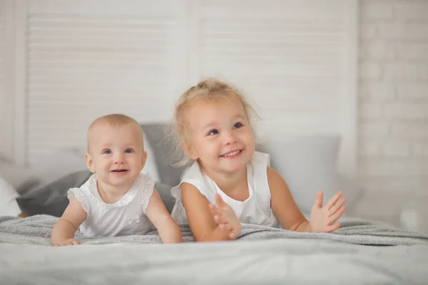 Top View Smiling Child Holding Hand Little Sister Lying White — Stock Photo, Image