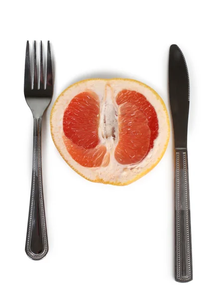 Grapefruit and fork — Stock Photo, Image