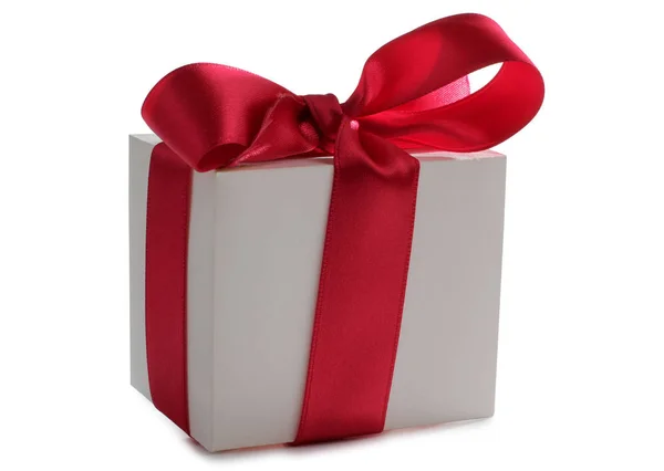 Box and red ribbon — Stock Photo, Image