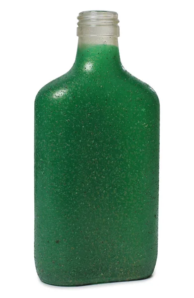 Зеленая бутылка на белом — стоковое фото