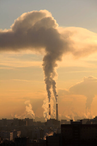 Building and smokie on sky