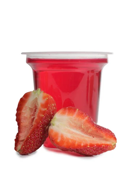 Plastic cup and berry — Stock Photo, Image