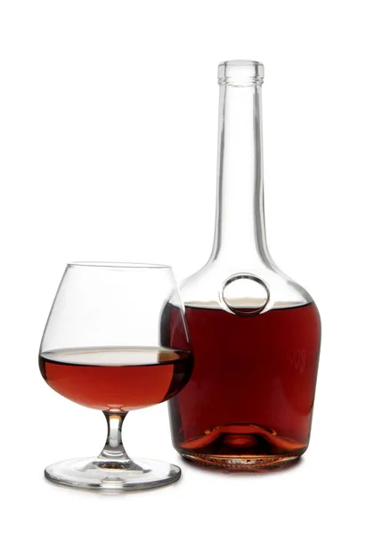 Láhev s brandy na bílém pozadí — Stock fotografie