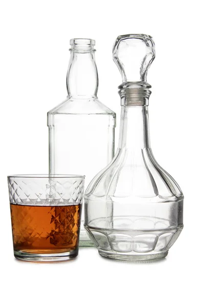 Bottiglie vuote di cognac su bianco — Foto Stock