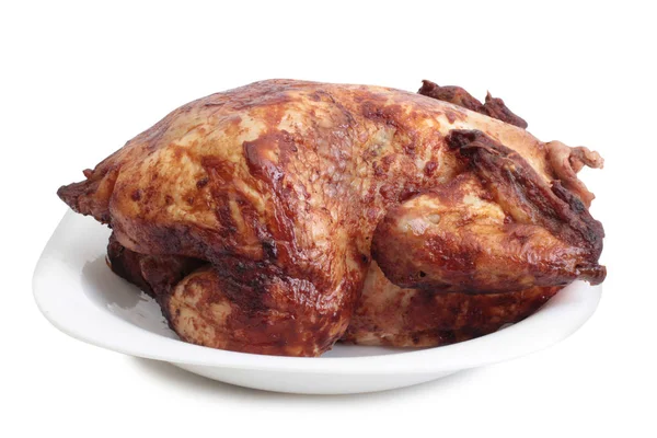 Куриное мясо на белой девятке — стоковое фото