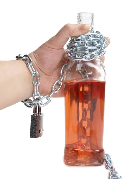 Alkohol üveg a kezében — Stock Fotó