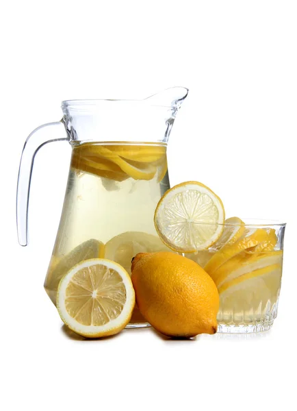 Lemon in glass on white eight — Stock Photo, Image