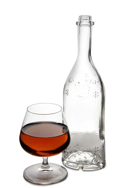 Butelkę brandy na osiem biały — Zdjęcie stockowe