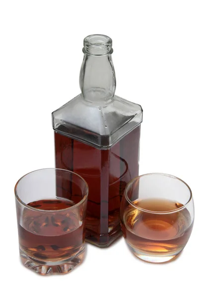 Cognacflasche auf weißem Elfer — Stockfoto