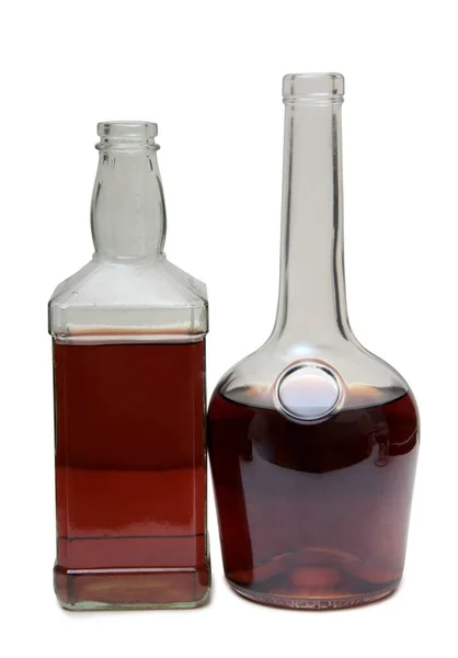 Cognac bottle on white fourteen — Stock Photo, Image