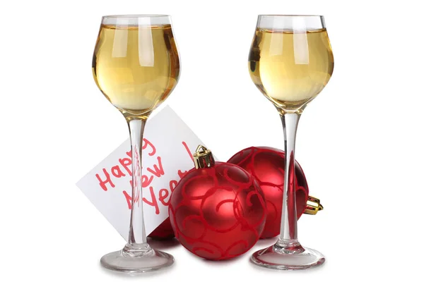 Bola de Navidad y tres copas de vino —  Fotos de Stock