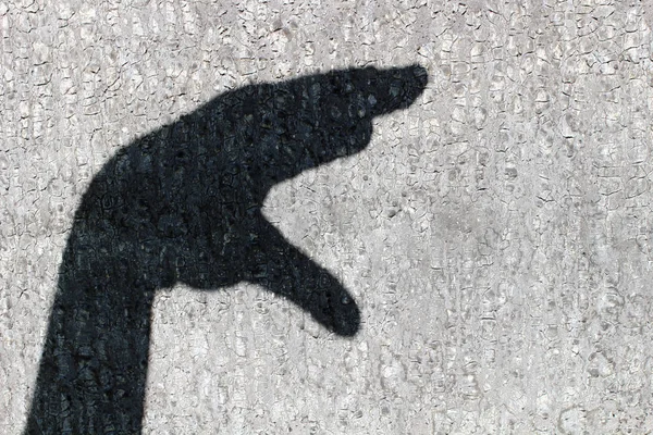 Dunkler Schatten Einer Männlichen Hand Auf Einer Betonwand — Stockfoto
