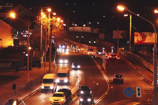 The car rides through the night city — Stock Photo, Image