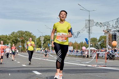 September 15, 2019 Minsk Belarus A marathon race in which an emotional woman runs to the finish line on a city road