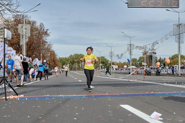 September 15, 2019 Minsk Belarus A tired woman runs to the finish line of the marathon