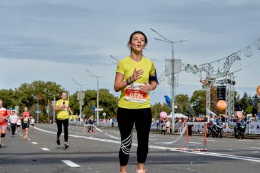 September 15, 2019 Minsk Belarus A marathon race in which a beautiful woman runs along a city road