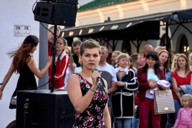 May 25, 2019 Minsk Belarus A young beautiful actress with a microphone is going to sing at a theater performance
