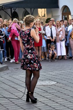 May 25, 2019 Minsk Belarus A street concert in which a woman with a microphone sings