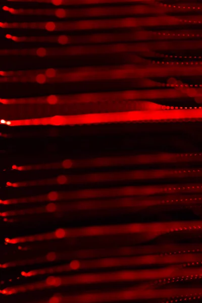 Background of red LED lights with bokeh effect