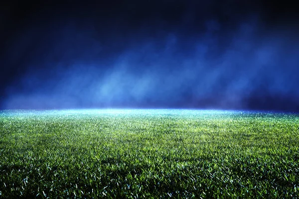 Night low view of maintained lawn at football stadium. — Stock Photo, Image