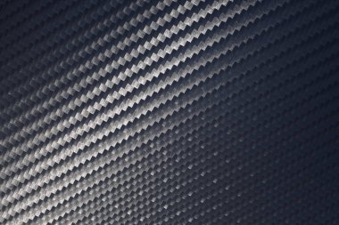 Örülmüş karbon fiber yaprağın yüzey dokusu
