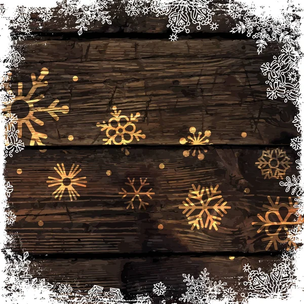 Flocons de neige dorés sur fond en bois . — Image vectorielle