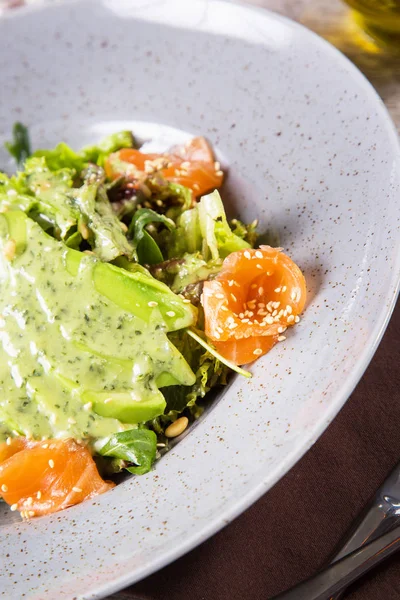 Salad with red fish and vegetable — Stock Photo, Image