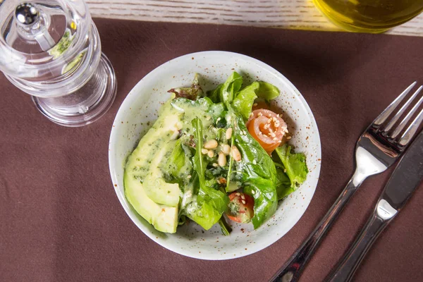 Salad with salmon and avocado — Stock Photo, Image