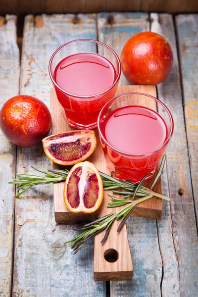 赤オレンジ色の果物のジュース — ストック写真
