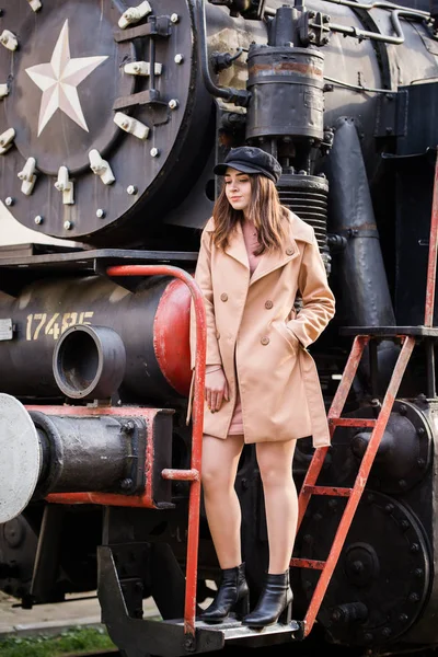 stylish woman on retro train