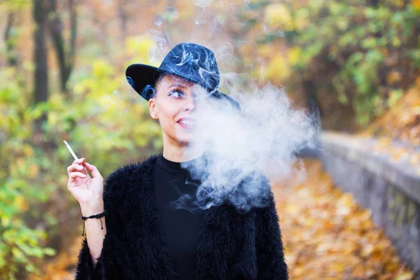 Stylish woman with smoke — Stock Photo, Image