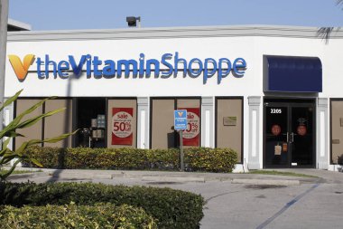 Vitamin Shoppe işareti ve mağazası