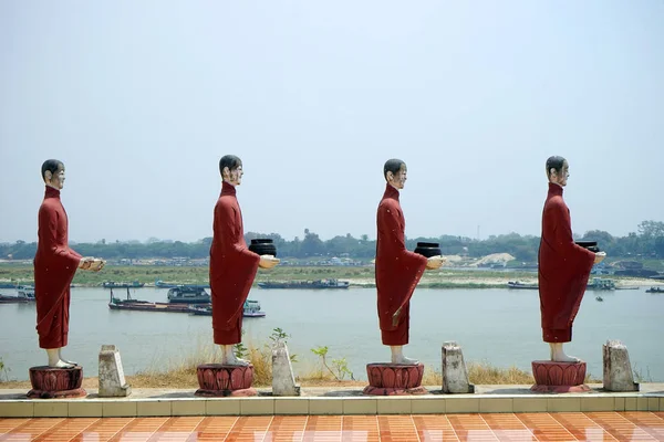 Row of monks — Stock Photo, Image