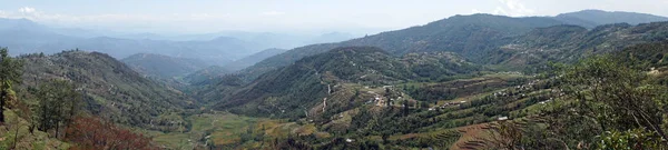 Terraces and village in mountain — Stock Photo, Image