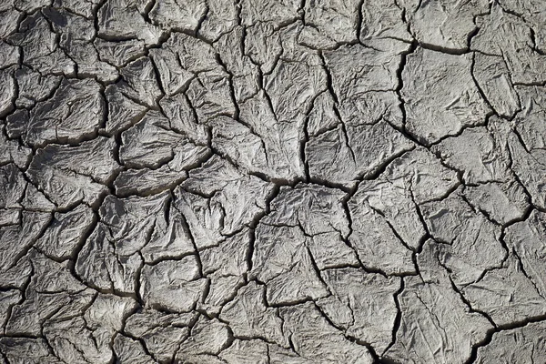 Argila rachada no deserto — Fotografia de Stock