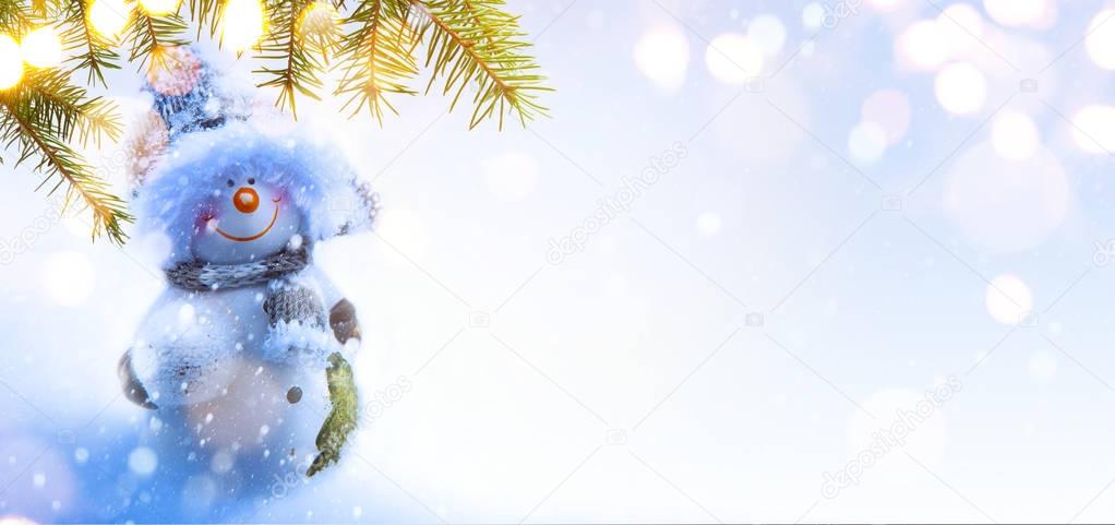 Art Christmas background with Christmas tree and holidays orname