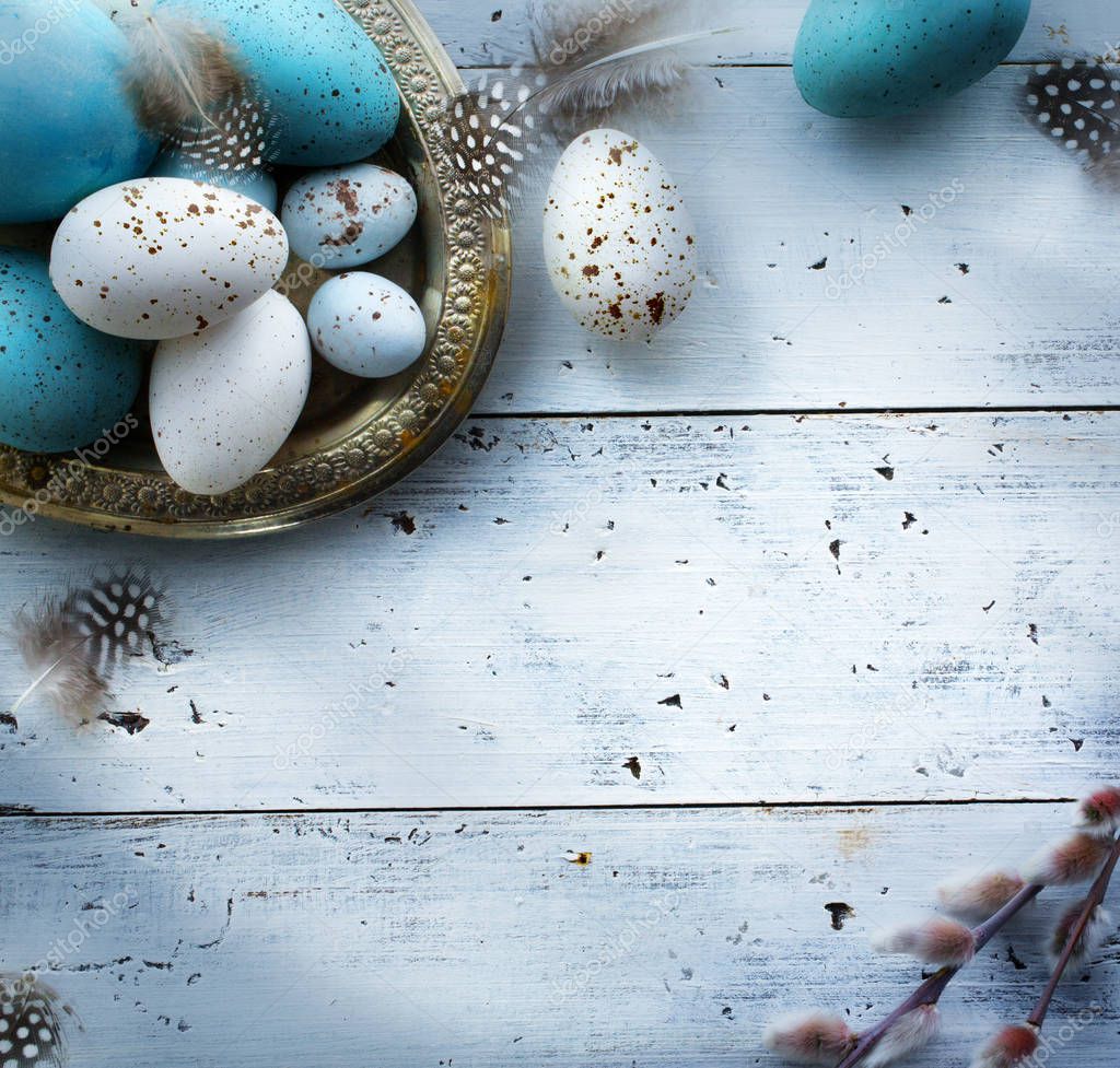  Easter background with Easter eggs on white table