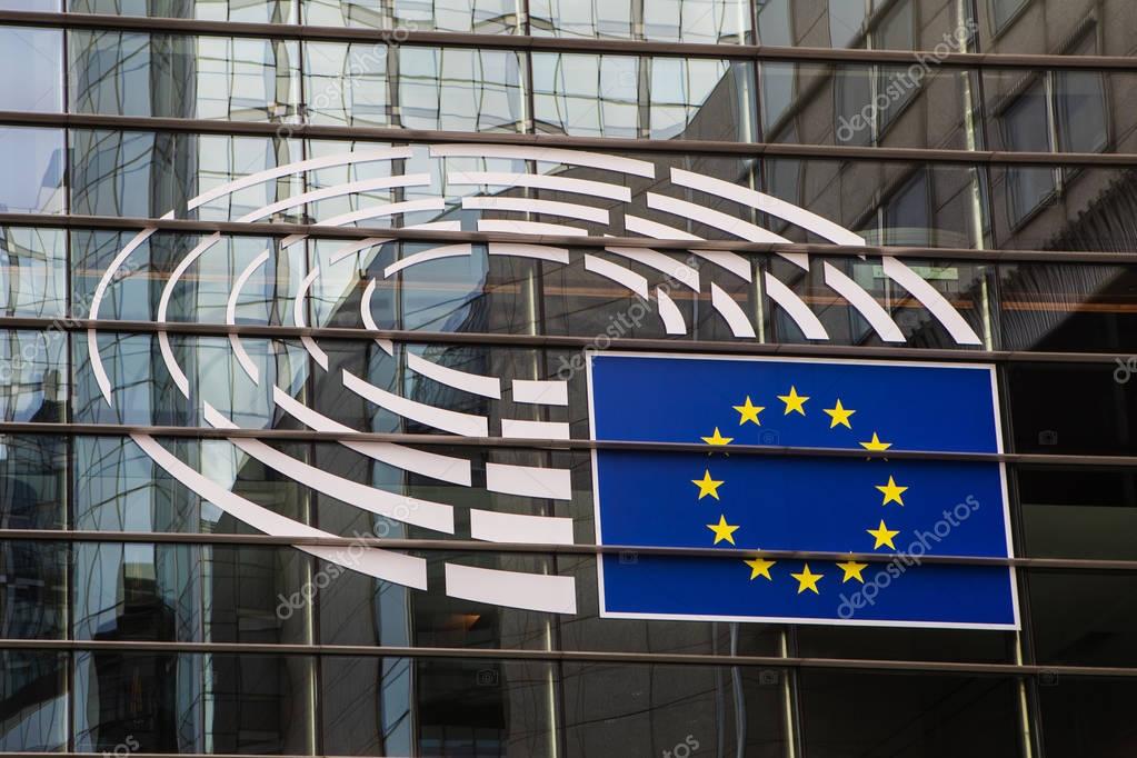 Brussels, Belgium -February 25, 2017: Logo of the European Parliament at the facade of European Parliament building in Leopold Square.