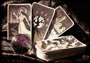 Occult paraphernalia, tarot cards and crystal ball