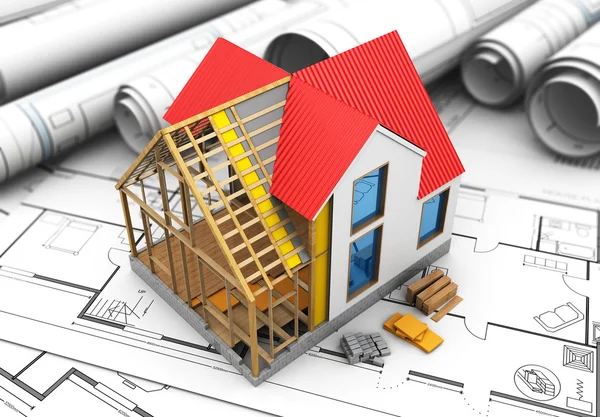 Frame house structure over blueprints — Stock Image Frame house structure over blueprints Stock Photo