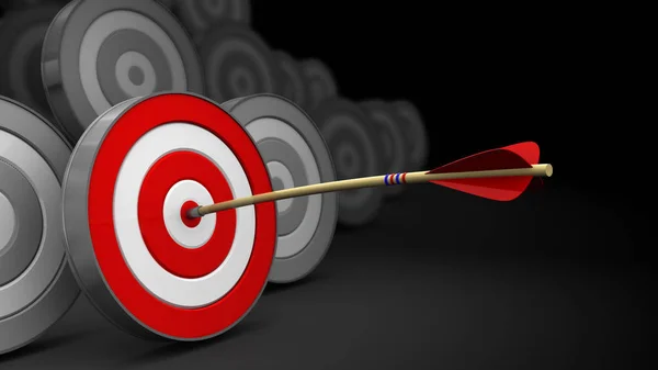 Arrow in target center with grey targets — Stock Photo, Image