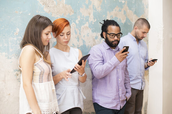 Young people with devices