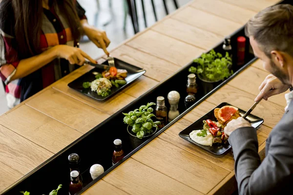 Cute couple in restaurant — Stock Photo, Image