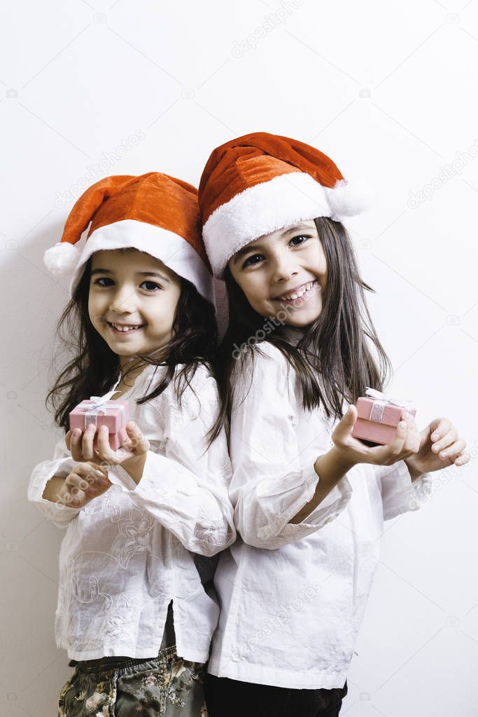 Two girls posing for Christmas
