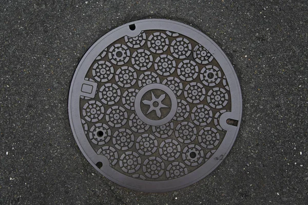 Circle steel manhole cove — Stock Photo, Image