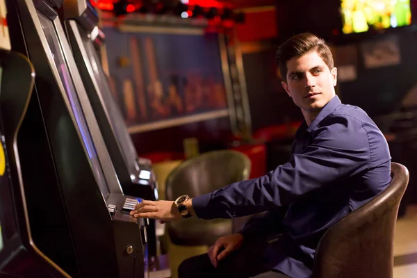 Young man in the casino — Stock Photo, Image