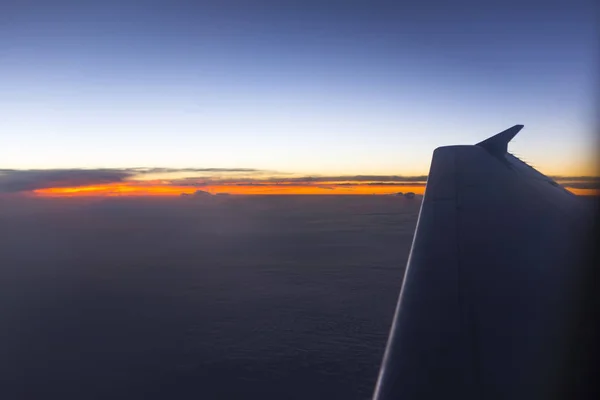 Zonsondergang van vliegtuig — Stockfoto