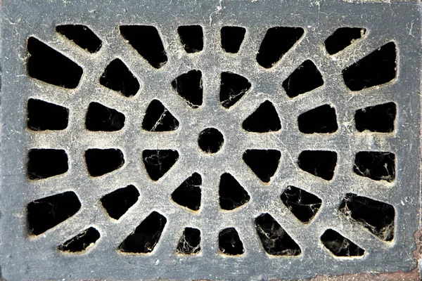 Texture of the metal manhole cover — Stock Photo, Image